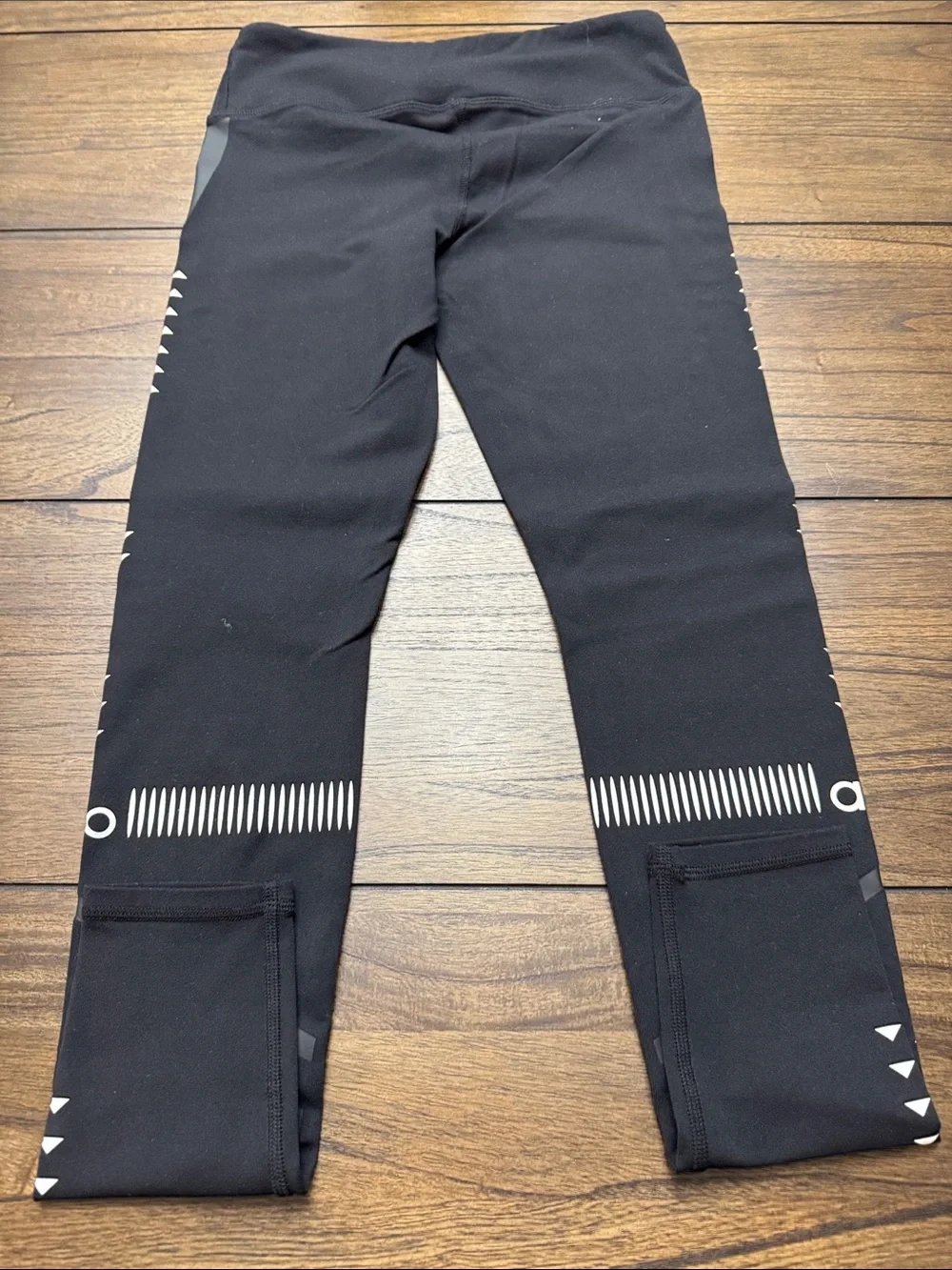 ALO Yoga Black Leggings with Subtle Reflective Accents